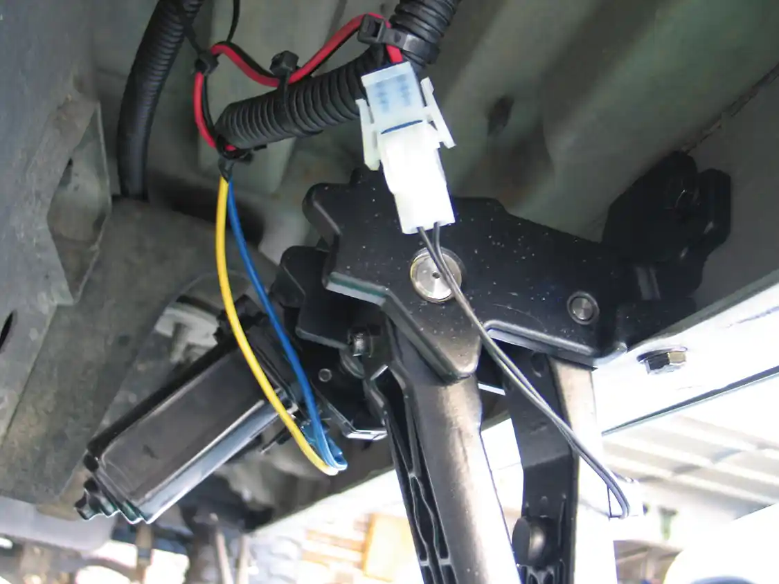 The black and red wires connect to the light connector and can be secured out of the way with cable ties.