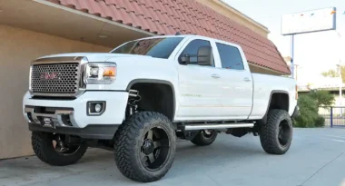 Javier Gomez's 2015 GMC Sierra Denali with a CST 8-10-inch lift kit, KMC XD-series wheels, and Nitta Terra Grappler tires.