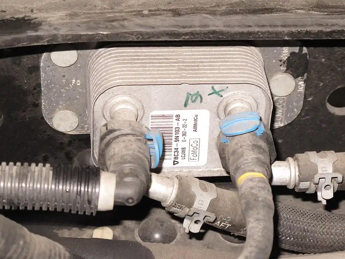 3. The fuel cooler is just forward of the pump and switching valve on the driver’s side of the frame. It must be replaced as the cross passages are a perfect place for DEF crystals to hide.