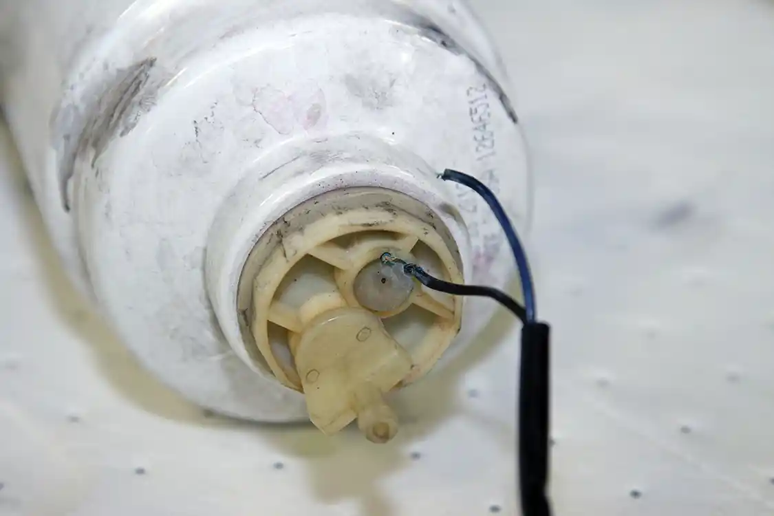 9. Looking at the water-in-fuel sensor harness, it was obvious that it was ready to fail (see arrow). In fact, when positioning the harness for our photos, the corroded lead actually broke away from the sensor.