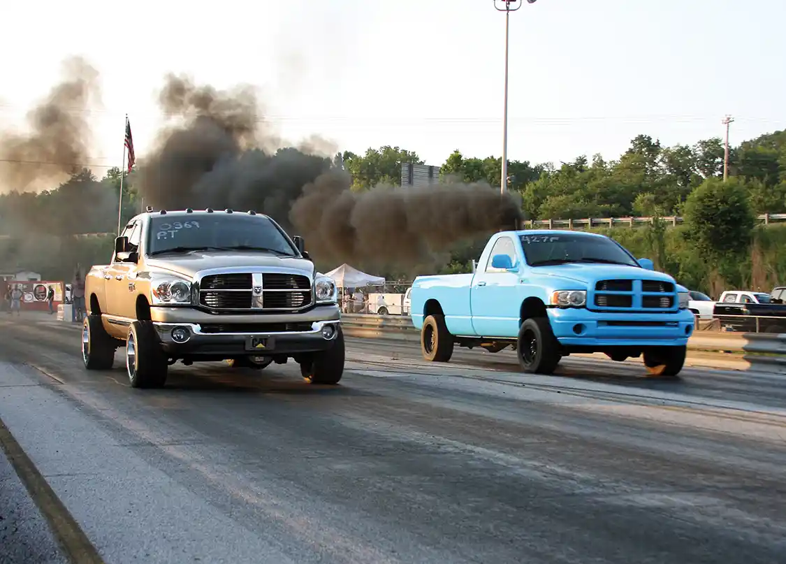 The 7.00 Index class final round was a very tight battle with Richard Hayes (left) crossing the line first but breaking out and handing the win to Daniel Pierce in the baby blue Dodge.