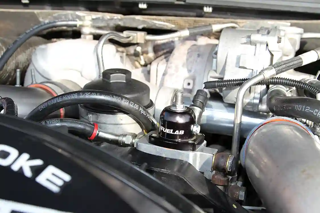 A <a href="https://fuelab.com/">FueLab</a> regulator is the heart of the Side Action Diesel Performance fuel bowl delete for the 6.4L <a href="https://www.powerstrokediesel.com/">Power Stroke</a> engine. Dual K16 pumps are used to supply fuel to the 100-percent-over SADP injectors.