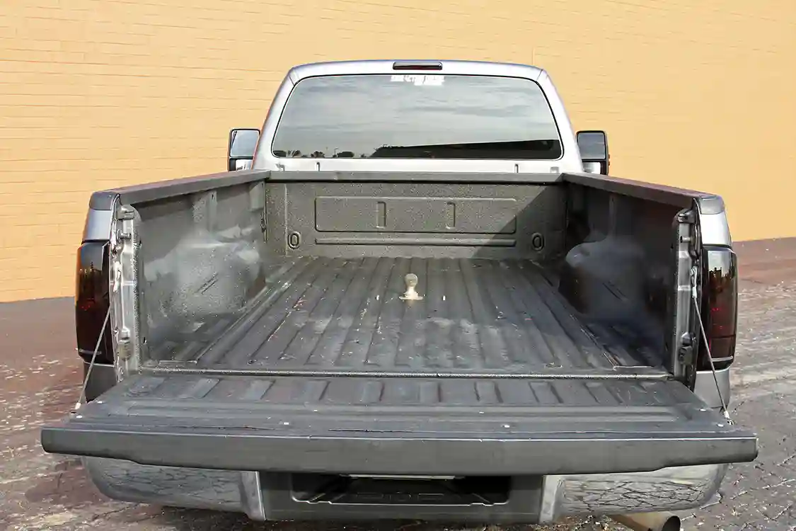 Lindenberg uses his truck for work as well as play, hence the B&amp;W gooseneck hinge and lined bed.