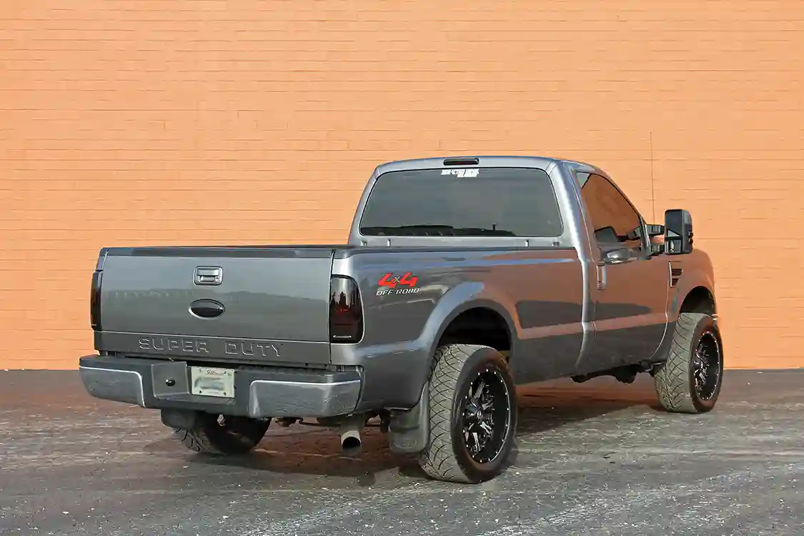 This is the view most drivers will get of Lindenberg's triple-turbo Ford, so he wanted to make it look good. Tinted taillights and color-matched handles give the exterior a very clean look.