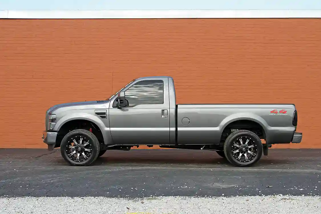 Painted accents on the mirrors and color-matched vents and door handles make this truck look great in profile. The 20-inch Fuel wheels and Nitto tires don't hurt either.