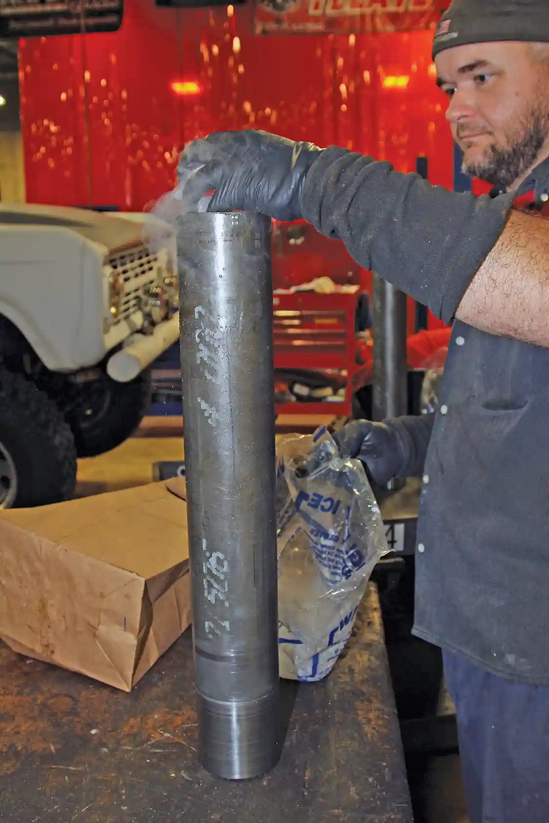 17. Fire and dry ice are used to make the machined parts fit together. Michael Powell used a torch to heat the housing while Nelson filled the end of the tube with dry ice purchased from the local grocery store.
