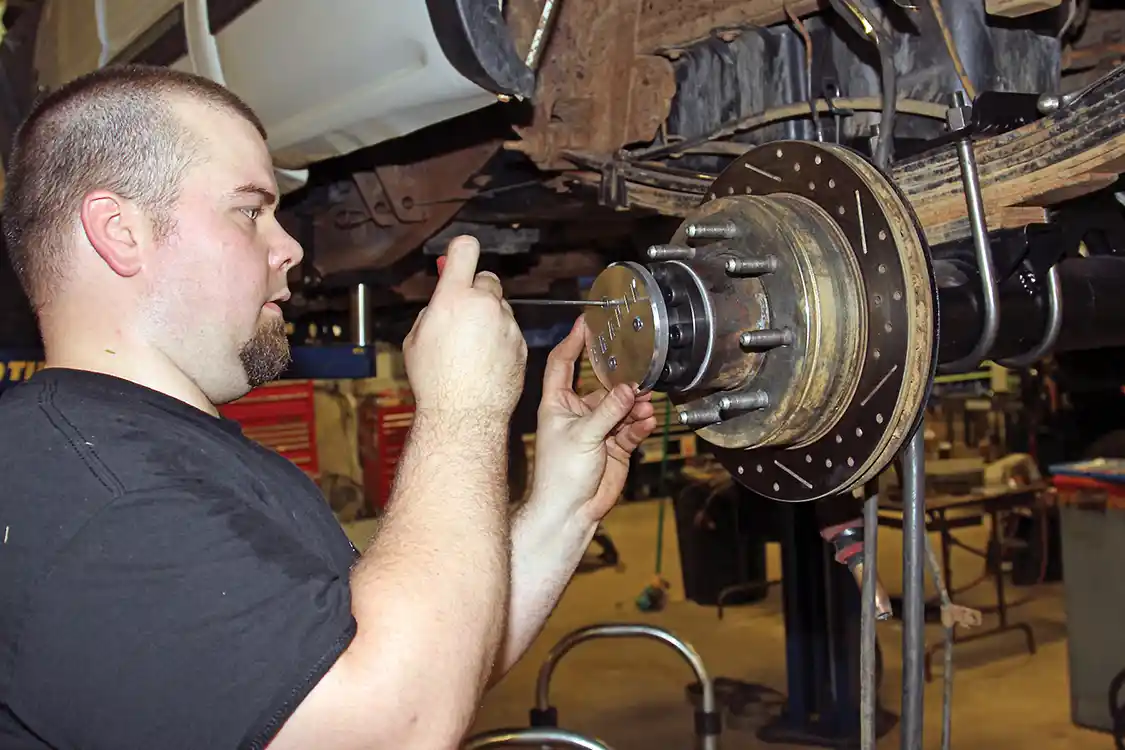 32. The Branik drive plate cover extends over the axle bolts making it legal to be used in most sled pulling organizations.