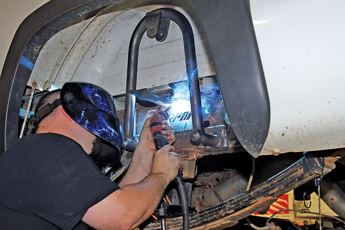 33. Miltier also fabricated the shock hoops to relocate the shocks to the outside of the frame for more stability, better handling and improved ground clearance over the factory shock positions further inboard and lower on the axle.