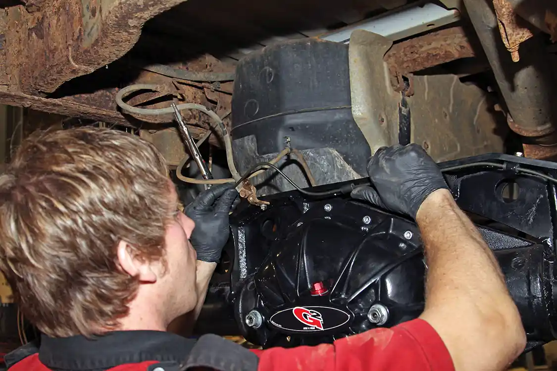 34. Rather than mess with the rusty old brake lines, Powell bent up a new set of lines to flow with the axle truss and keep the lines out of harm’s way when off road.