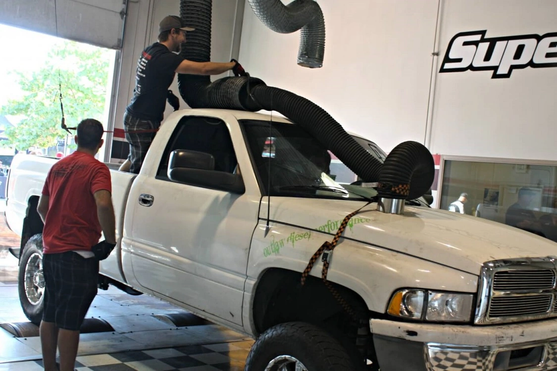 Don’t judge… while maybe not the best way to keep the exhaust ventilation ducting over a hood stack, this setup proved practical and effective.