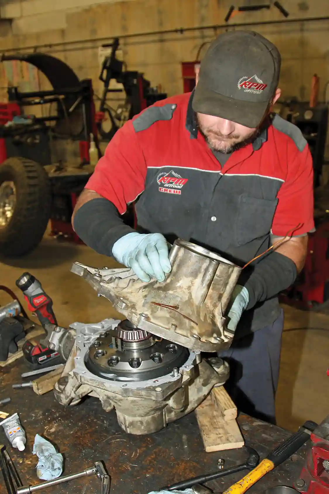 20. While the case halves were apart he drilled and tapped a hole in the passenger-side case to route the copper ARB air tube out of the housing. After the lash is finalized he applied sealant on the mating surfaces and bolted the case halves together.