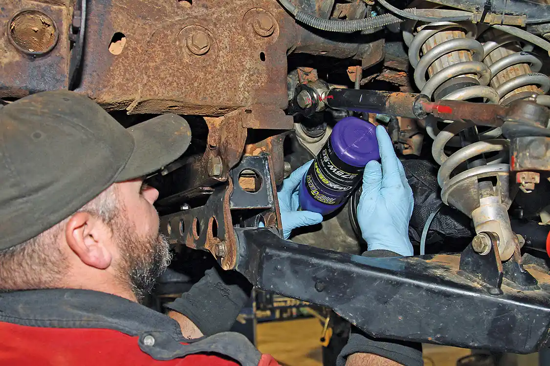 29. Nelson fills the differential with Royal Purple 75W-90 Max Gear synthetic gear oil.