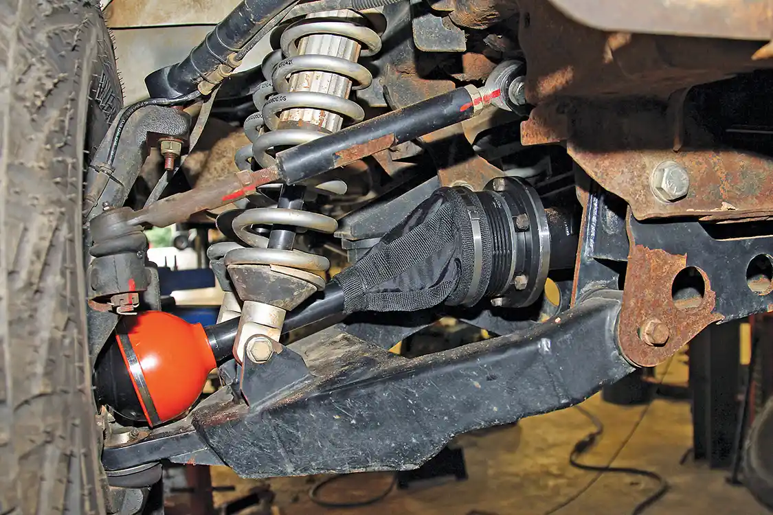 31. Here’s a close-up look at the upgraded axle assembly. Those bright orange RCV dome seals will give us peace of mind as we bomb through the desert in our Chevy.
