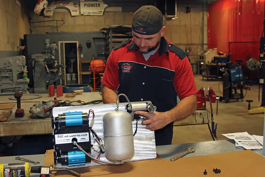 33. The ARB equipment is mounted on the aluminum panel Holbrook cut to keep the whole assembly in one convenient location and make it easier to transfer it over when we do a short bed conversion on the truck in the future.