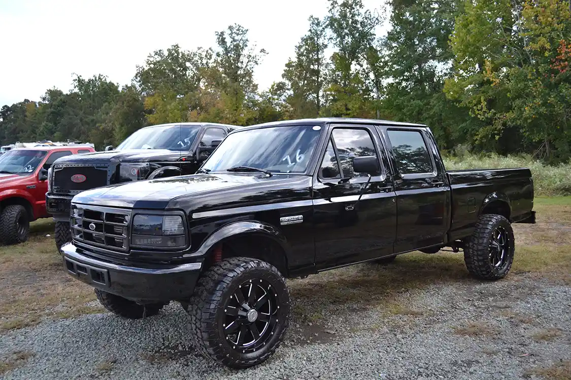 This super clean OBS (old body style) truck made us stop in our tracks, and is one of the finer examples of one of these trucks that we've seen in a while. The blacked-out rig had some performance modifications too, as a custom intercooler could be spotted through the grille.