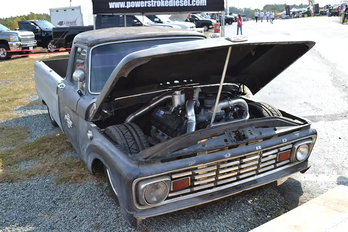 From large to low, this smooth Ford project was also on display. The <a href="https://www.powerstrokediesel.com/">Power Stroke</a>-powered ride was literally on the frame, thanks to a lot of custom suspension and chassis work.