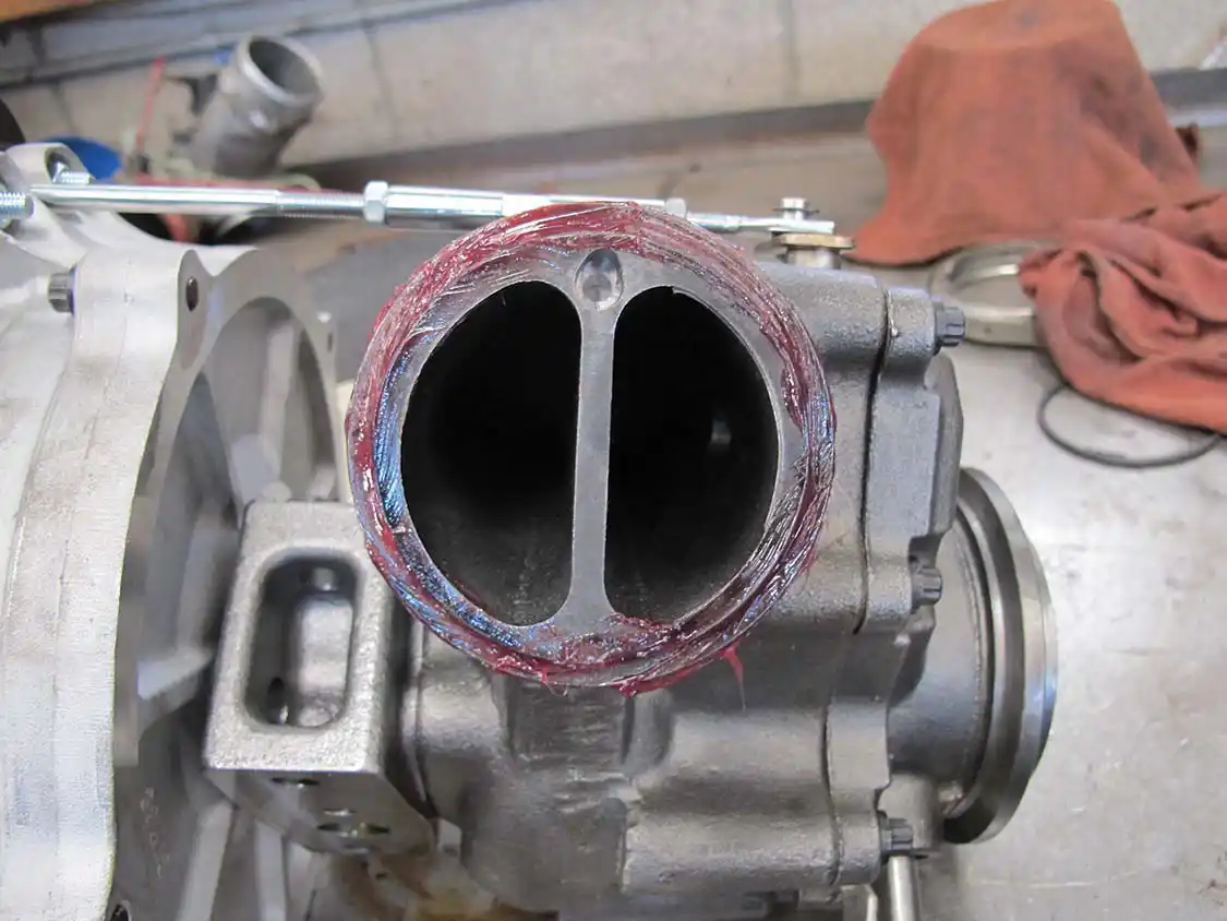 11. Simply coating the flange of the turbo adaptor with high-temp grease is all that’s needed to hold the O-ring in place for ease of assembly.