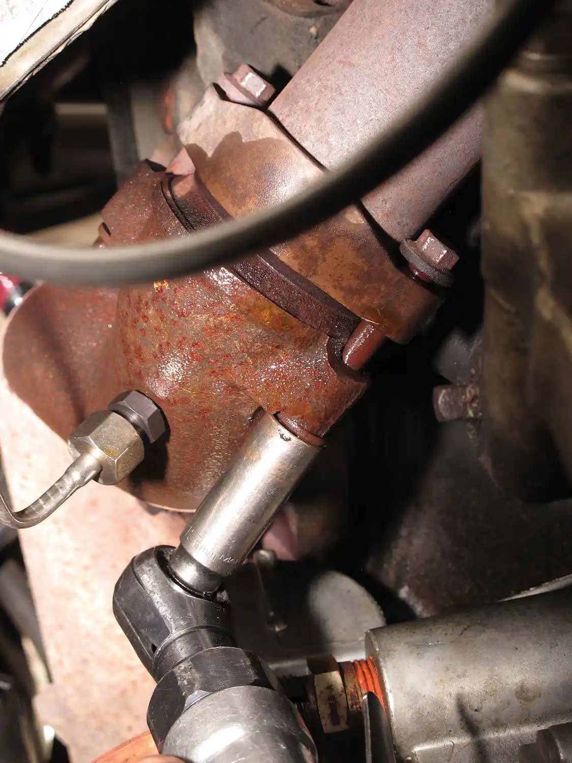 15. The turbo up-pipes are installed loosely on the top and bottom. Once in place, they can be tightened down at all points, top and bottom.