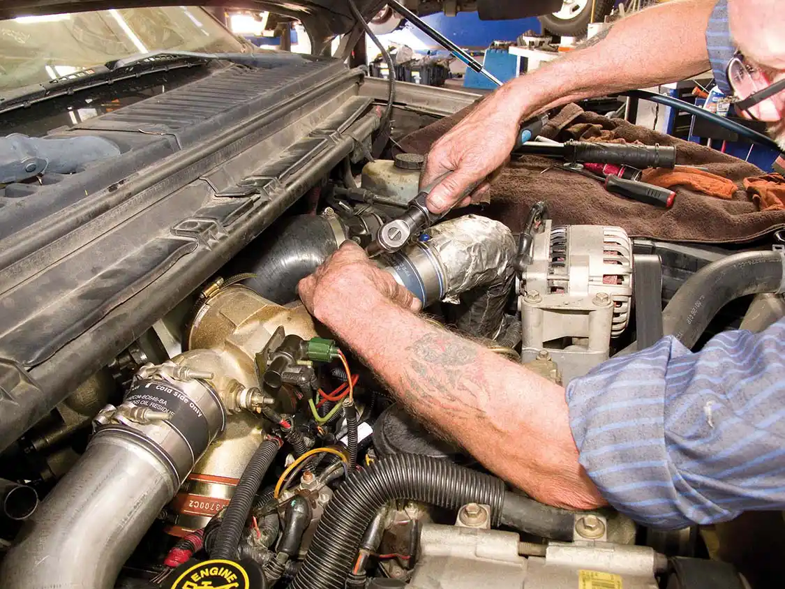 18. Tighten all the hose clamps and then recheck after a warm-up and cool-down cycle.