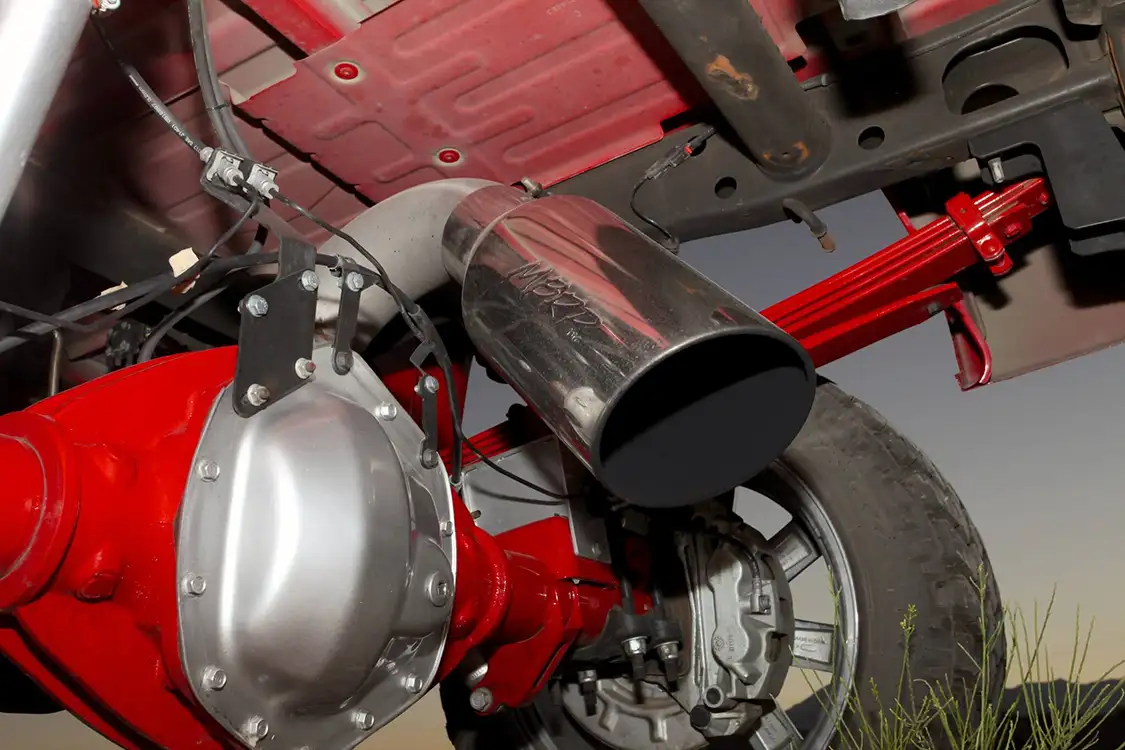 The gigantic 8x18 <a href="https://www.mbrp.com/">MBRP</a> chromed exhaust tip exits just behind the rear end.