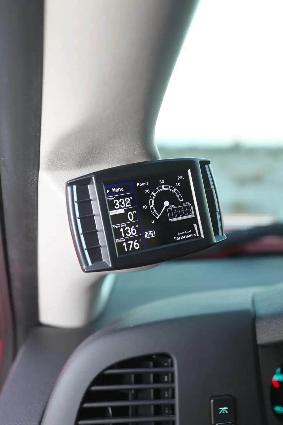 Providing push-button power is the <a href="https://hs-motorsports.com/">H&amp;S</a> Mini Maxx Race Tuner that has been mounted in an A-pillar.