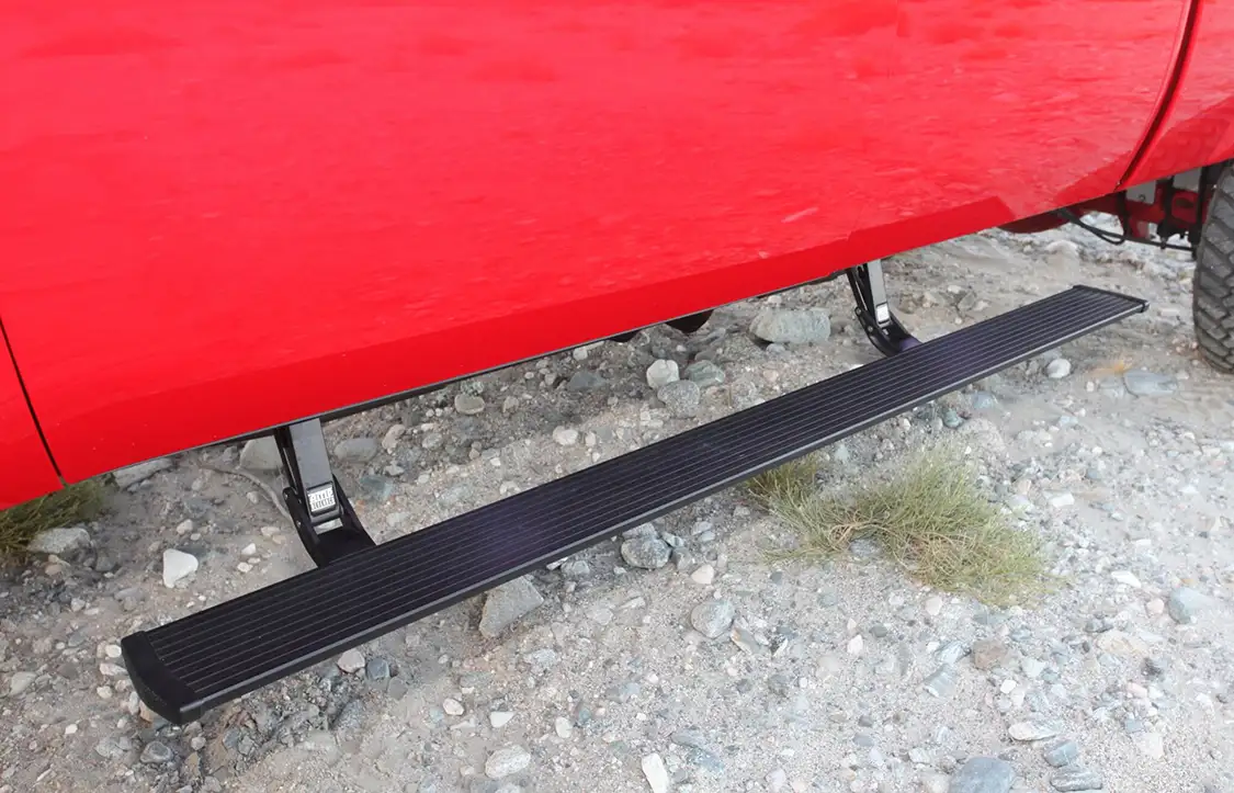 A set of <a href="https://www.amp-research.com/">AMP Research</a> steps makes it easy to enter the truck even with its 7.5-inch lift.