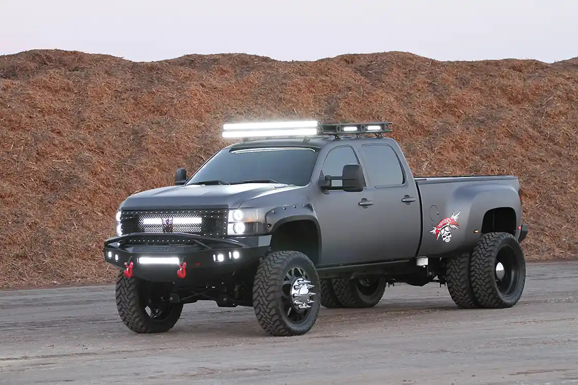 All 24 Rigid Industries LED light bars, lights and Plain an Simple projector headlights transform Barraza’s Silverado dually into a rolling LED beacon.