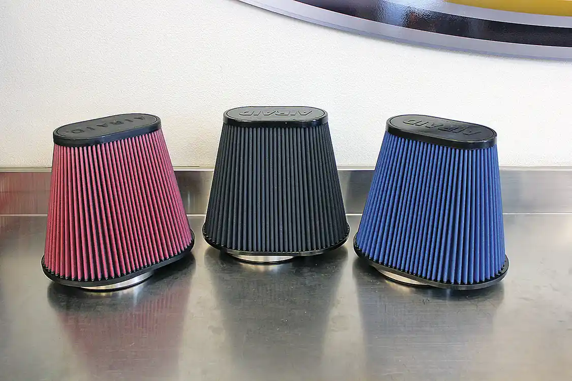 12. The last piece of the puzzle is the filter itself. AIRAID offers all of its intake systems in two filter styles and four colors. There’s a traditional red oiled filter media, or SynthaMax dry filter media in red, blue or black. The filters are virtually identical in terms of filtration and flow, making the proper choice a matter of personal preference. All AIRAID filters carry a lifetime warranty.