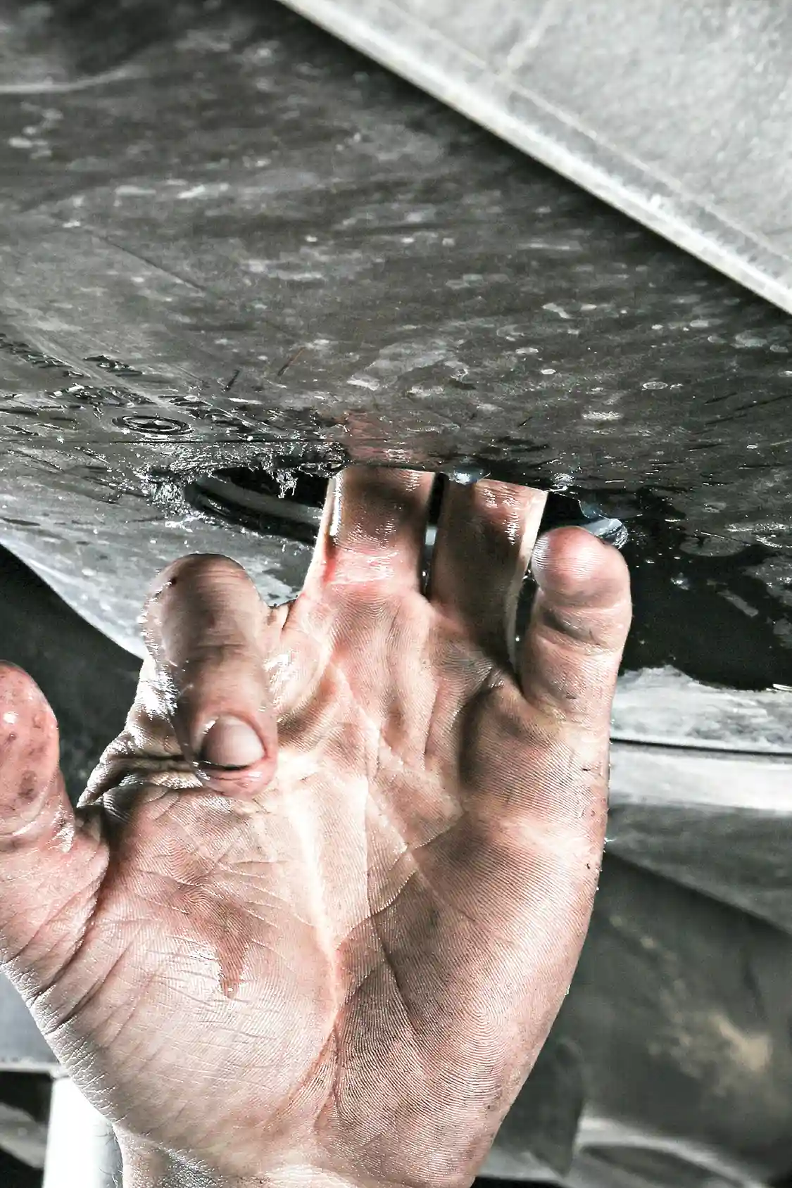 11. Once the fuel has drained, a 3 ¼-in. hole saw finishes off the job you’ve started with a pilot bit. With the large section of tank drilled out, you can simply reach inside with your hand to remove any shaving or debris on the bottom side of the tank to be sure you have a clean, flush surface for the DRP sump kit to mate up to. Remove any burrs before proceeding.