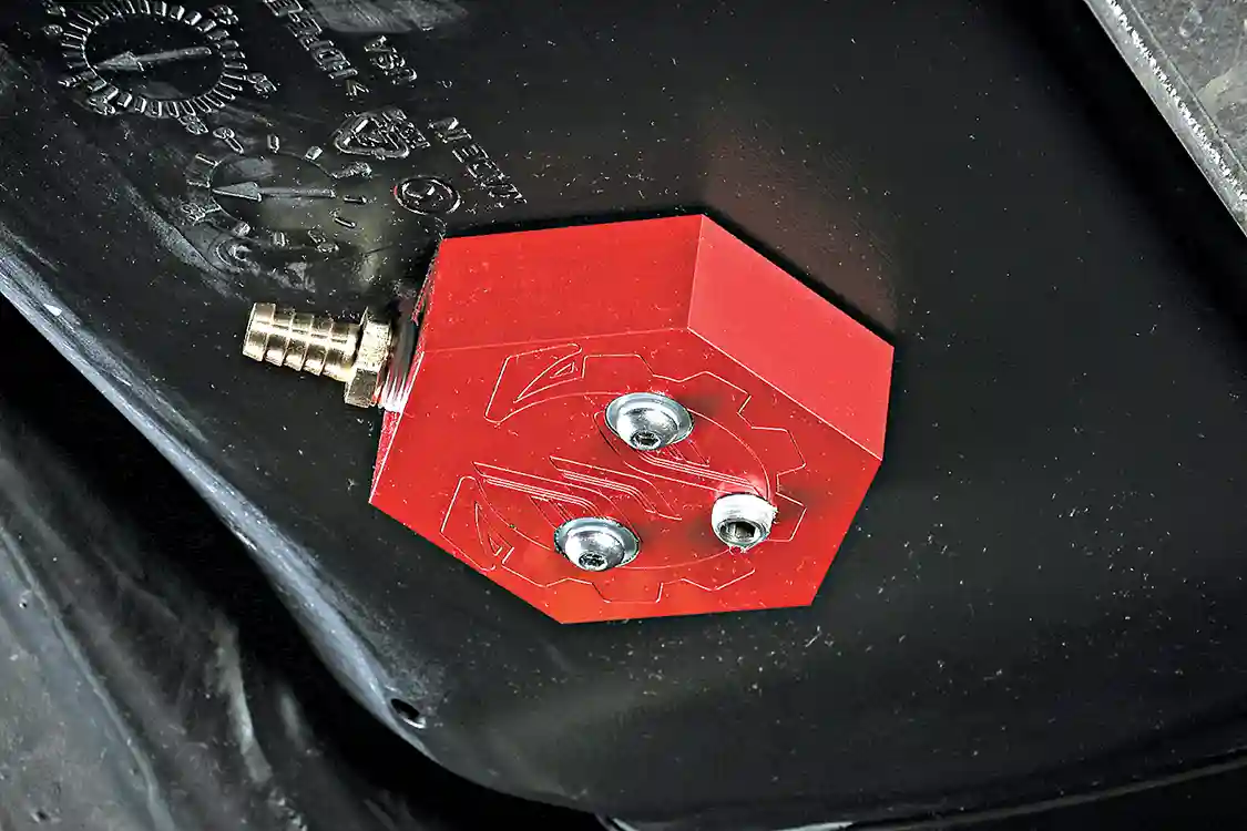 14. The fuel hose can be slid onto the barbed fitting of the fuel sump and the tank can be refilled with fuel. The new DRP sump should offer quieter lift pump performance, along with reduced wear on the pump since it won’t have to fight as hard to pull fuel from the tank, as gravity can now aid in feeding the lift pump. Plus, there are no more worries of ¼-tank troubles and sucking air. Just know that with a sump, once the motor stops from a low fuel condition, you’re not low… you’re out. This is a downside for some, so if you want to keep your original fuel reserve, take the extra time and install the Fuelab in-tank pick-up.