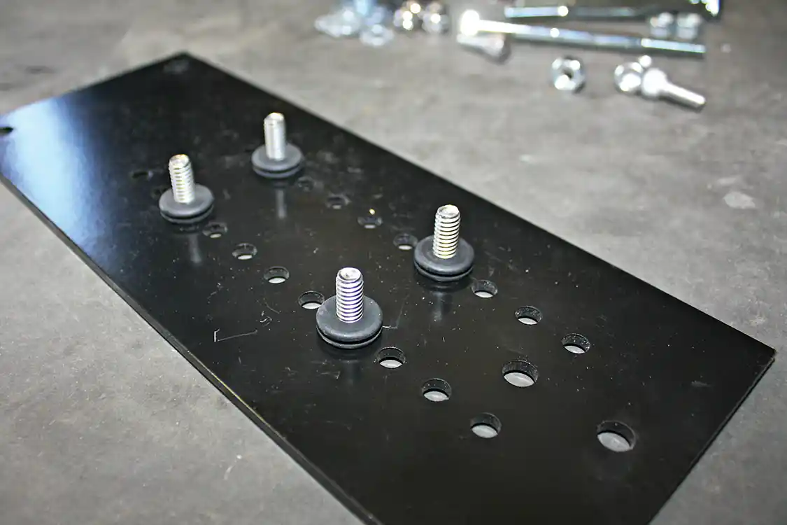 3. Fuelab’s unique frame mount bracket comes pre-drilled with multiple holes to allow complete adjustability of the pump’s vertical mounting position under the truck. The included studs can be installed in your selected holes and small rubber bushings will work as isolators to help limit vibration and noise from the lift pump kit being transmitted into the chassis.