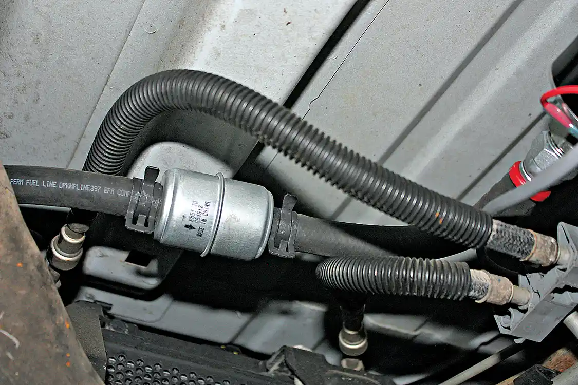 6. To help protect the pump from foreign objects, Fuelab includes an inline filter that needs to be installed in the new feed line that runs from the pick-up tube to the inlet of the pump. Again, on this application, the feed line is going to be pulling fuel from the DRP sump that will be installed on the bottom side of the fuel tank.