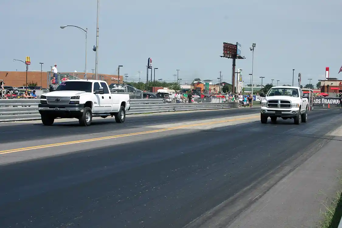 The ET Bracket final round pitted Cummins against Duramax with Adam Price and his Dodge driving around Brandon Hodge and his Chevy to take home a priceless Scheid Diesel Extravaganza win.