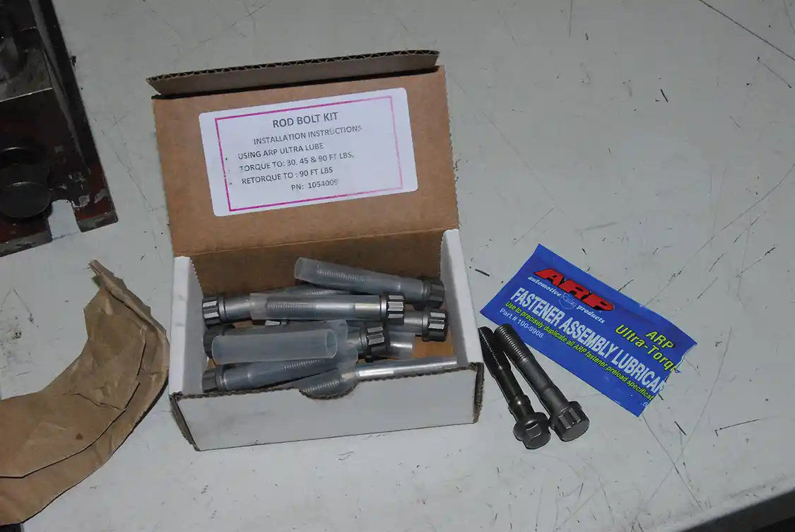 10. Any high-performance engine needs stouter fasteners. The UNOH engine used mostly ARP bolts throughout. You can see the difference in appearance between the stock bolts and the 12-point ARPs. The new bolts are designed to yield at 220,000 psi.