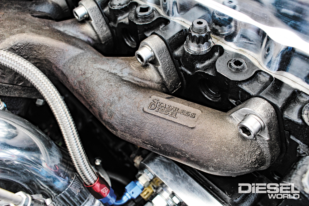 Stainless Diesel Competition T-6 exhaust manifold with full length, 1.65-inch internal ports. ARP Head Studs