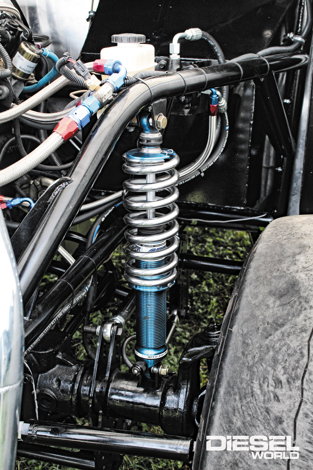 AFCO coil over shocks tie the chassis in with the axles and feature double-adjustability