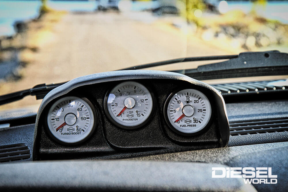 Auto Meter triple gauge dash pod and trio of Isspro factory match gauges