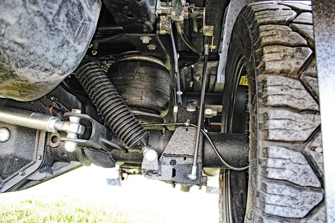 Dodge Ram four-link rear suspension, 7-inch diameter Firestone air bags, dual Viair compressors, Kelderman’s manual height control valves