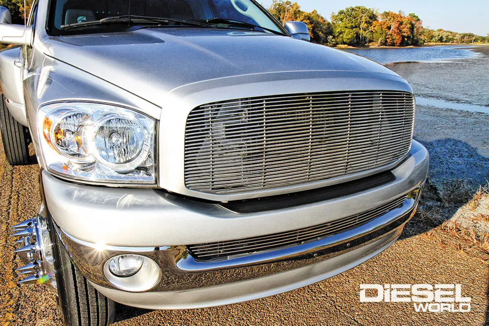 2006 Dodge Ram paint-matched modified sport grille, paint-matched valance and bumper trim, billet aluminum grille and bumper inserts